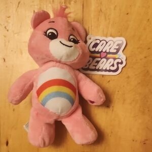 Care Bears Pink and White Stuffed Animal with Rainbow Belly